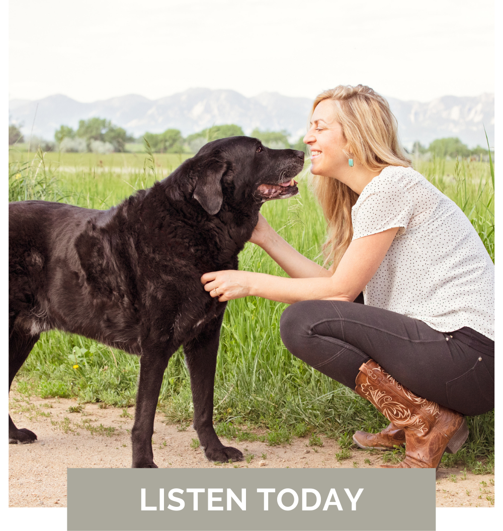 Marissa Martino, a positive dog training expert, crouches next to a black dog.